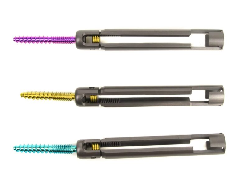 Three MIS pedicle screws with long access extensions and colored shafts
